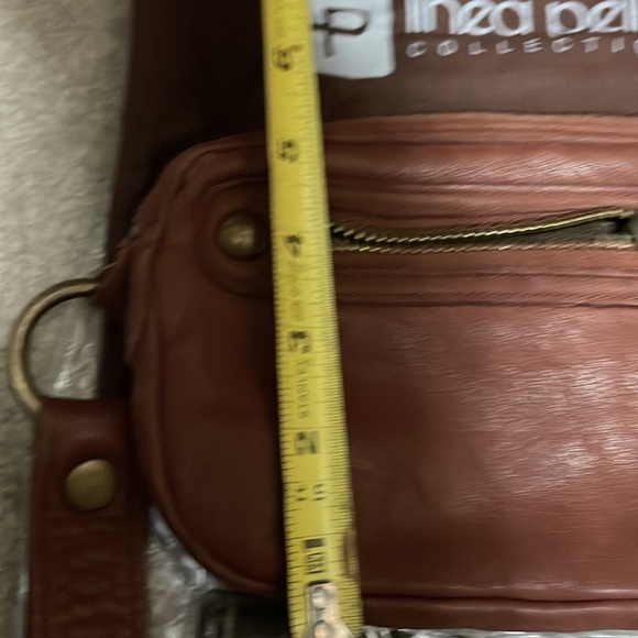 New, LINEA PELLE leather wristlet. Inside zip pocket, front zip, and top zip. - Picture 4 of 7